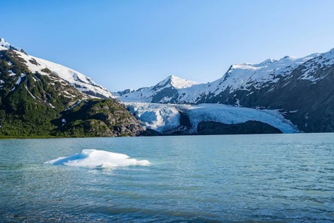 Snowy mountains and glaciers Portage Glacier on Portage Lake glacial lake, Chugach National Forest,