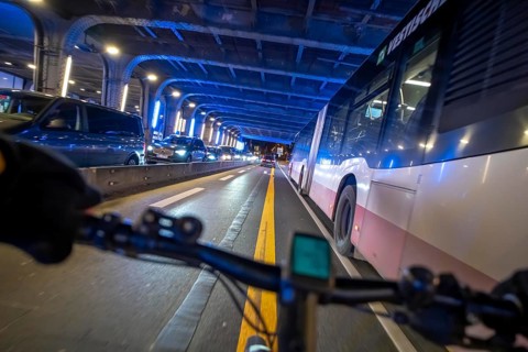 Cycling in the city, in the dark, in the evening, cycling underpass at the main train station, in