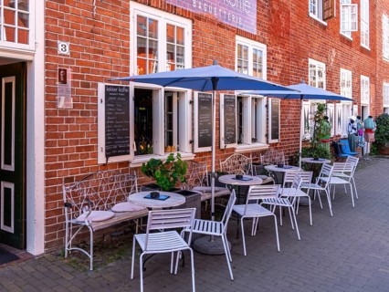Catering, retail and typical, historic architecture in the Dutch Quarter in Potsdam, Brandenburg,