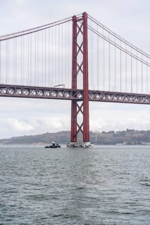 The Ponte 25 de Abril, 3.2 km long bridge in Portugal with a 2278 meter long suspension bridge