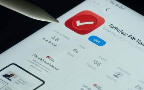 Dhaka, Bangladesh- 30 Oct 2025: TurboTax app on a iPad screen with a pen pointing at the install