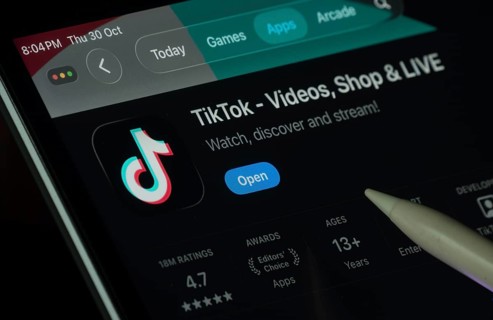 Dhaka, Bangladesh- 30 Oct 2025: TikTok app displayed on a iPad screen in dark mode with a digital
