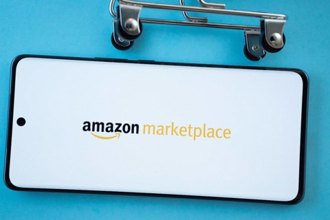 Dhaka, Bangladesh- 21 Nov 2025: Smartphone screen showing the amazon marketplace logo with shopping