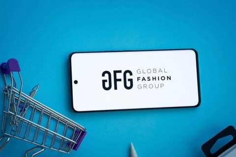 Dhaka, Bangladesh- 21 Nov 2025: Smartphone displaying Global Fashion Group logo with shopping cart