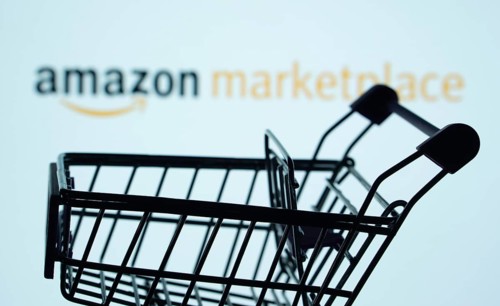 Dhaka, Bangladesh- 21 Nov 2025: Silhouette of a shopping cart in front of the amazon marketplace