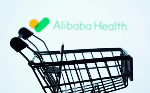 Dhaka, Bangladesh- 21 Nov 2025: Silhouette of a shopping cart in front of the Alibaba Health logo,