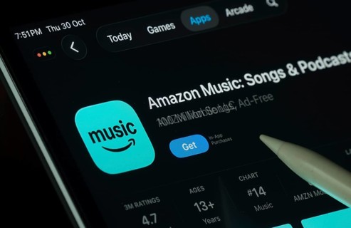 Dhaka, Bangladesh- 21 Nov 2025: Amazon Music app displayed on a iPad screen in dark mode with a
