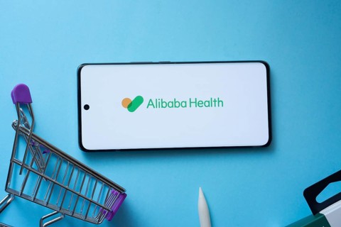 Dhaka, Bangladesh- 21 Nov 2025: Smartphone displaying Alibaba Health logo with shopping cart on a