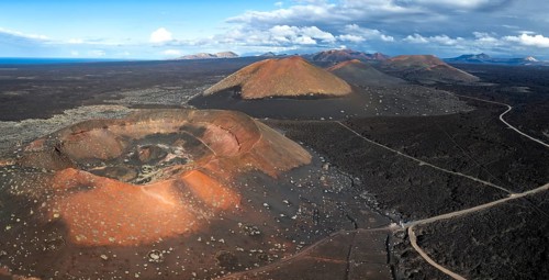Montaña Quemada and Montaña Pedro Perico volcanoes, volcanic landscape with craters and lava