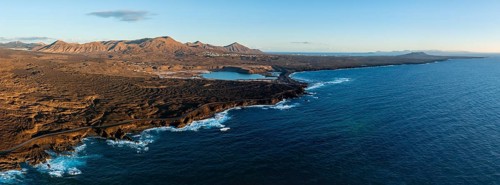 Coast with lava fields, volcanic landscape near Los Hervideros, in the evening light, aerial view,