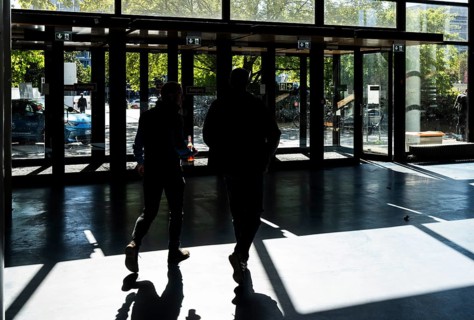 Foyer in a building of the Technical University of Berlin, light and shadow from people at the