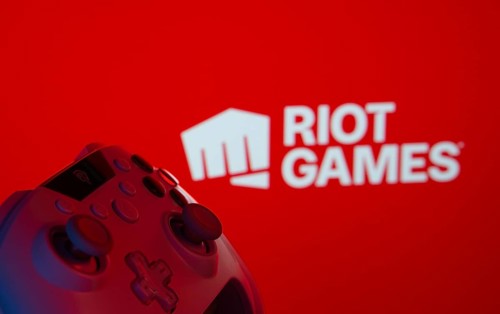 Dhaka, Bangladesh- 14 Nov 2025: A close-up of a gamepad with the Riot Games seen on screen in the