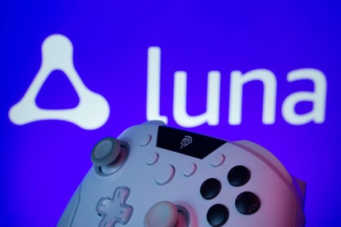 Dhaka, Bangladesh- 14 Nov 2025: A close-up of a gamepad with the Amazon Luna seen on screen in the
