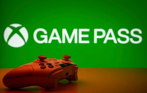 Dhaka, Bangladesh- 19 Sep 2025: A close-up of a white gamepad with the Xbox Game Pass seen on