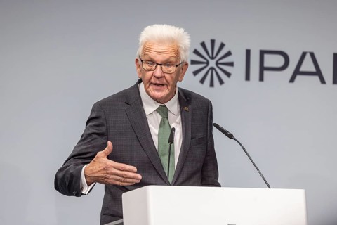 Winfried Kretschmann (Greens), Minister-President of Baden-Württemberg. portrait at the lectern