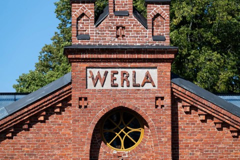 Brick façade with inscription Werla, former paper factory and mill for the production of groundwood