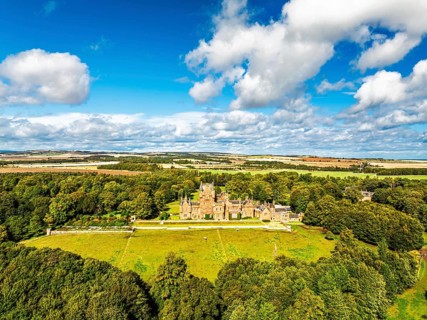 Ayton Castle from a drone, Ayton, Eyemouth, Scottish Borders, Scotland, UK