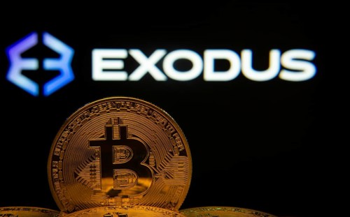 Dhaka, Bangladesh- 06 Sep 2025: Close-up of Bitcoin coins with the Exodus logo visible on a screen