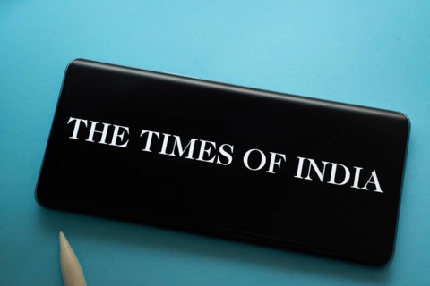 Dhaka, Bangladesh - 18 March 2025: The logo of the times of india is displayed on a smartphone