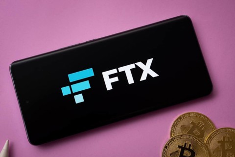 Dhaka, Bangladesh- 03 Saep 2025: FTX logo on smartphone screen near Bitcoin coin and QR code on
