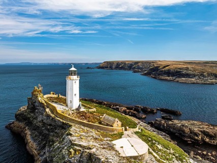 Godrevy Lighthouse from a drone, Godrevy Island, St Ives Bay, Cornwall, England, United Kingdom