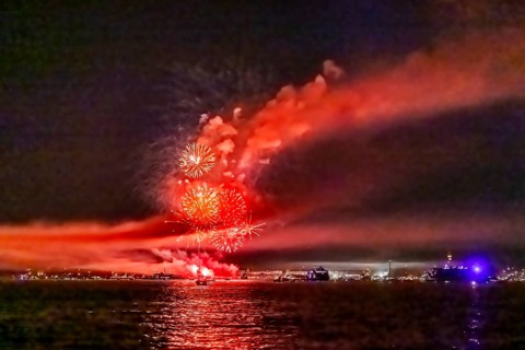 Lake Night Festival Constance. Water fireworks over the German shore and the neighbouring Swiss