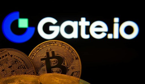 Dhaka, Bangladesh- 08 Aug 2025: Close-up of Bitcoin coins with the Gate.io logo visible on a screen