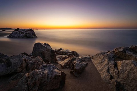 The sun rises on the Costa Rei, a stretch of coastline on the Italian Mediterranean island of