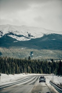 Winter road trip on the Icefields Parkway with lots of snow and ice, Banff National Park, Jasper