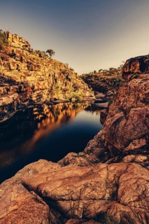 Bell Gorge waterfall, a body of water in north-west Australia in the Kimberley. Sunrise in the