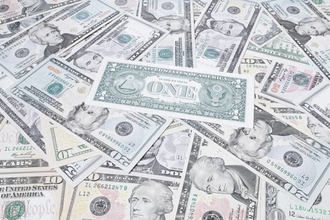 Various US dollar notes in a pile, banknotes