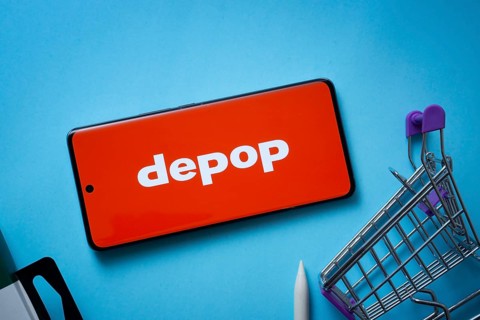 Dhaka, Bangladesh- 03 July 2025: Smartphone displaying Depop logo with shopping cart on a blue