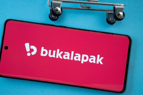 Dhaka, Bangladesh- 03 July 2025: Smartphone screen showing the Bukalapak logo with shopping cart