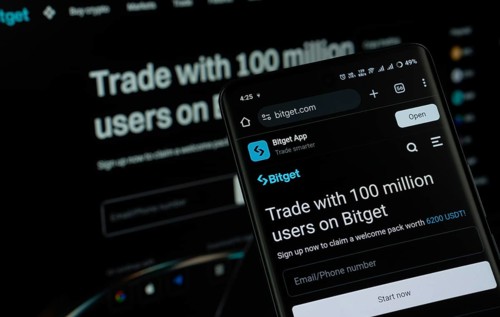 Dhaka, Bangladesh - 27 July 2025: The logo of Bitget is displayed on a smartphone screen, and the