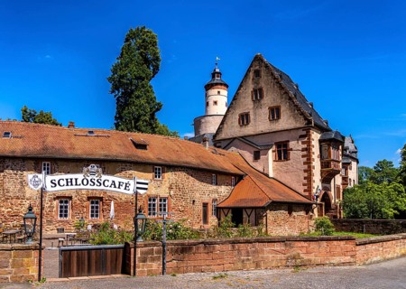 The old castle with Barbarossaplatz and the castle café in the old town centre of Büdingen, Hesse,