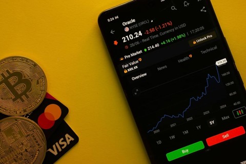 Dhaka, Bangladesh- 30 June 2025: Smartphone displaying Oracle stock data on a trading app with