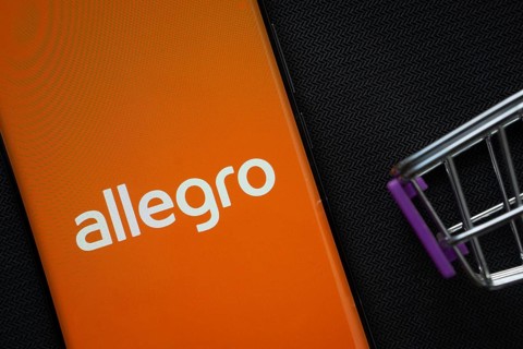Dhaka, Bangladesh- 03 July 2025: A smartphone displaying the Allegro logo next to a miniature