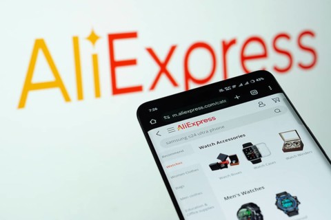Dhaka, Bangladesh- 03 July 2025: Smartphone displaying AliExpress web interface against AliExpress