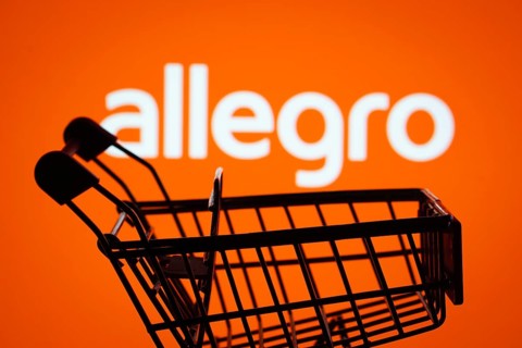Dhaka, Bangladesh- 03 July 2025: Silhouette of a shopping cart in front of the Allegro logo,