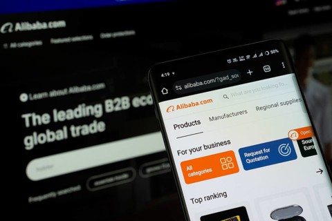 Dhaka, Bangladesh- 03 July 2025: Smartphone displaying Alibaba web interface against Alibaba