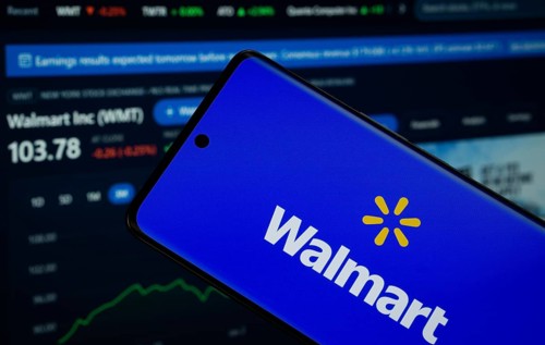 Dhaka, Bangladesh- 15 July 2025: Walmart logo is displayed on a smartphone screen, with a stock