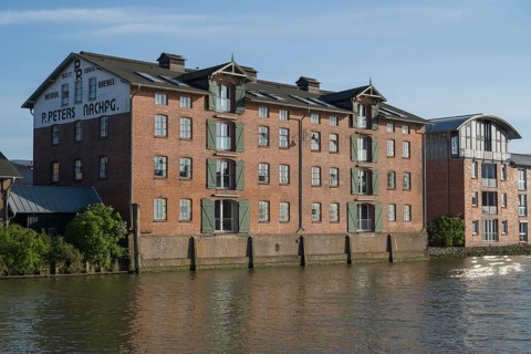 Warehouse building at the harbour, brick building, Husum, North Sea, North Frisia,