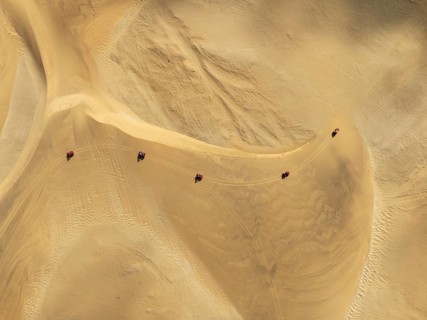Quad bikes in the dunes of the Namib Desert in the vicinity of the coastal town of Swakopmund.