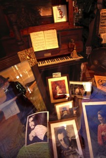 Shop window decoration in honor of Giuseppe Verdi, with pictures of opera Opera singer and