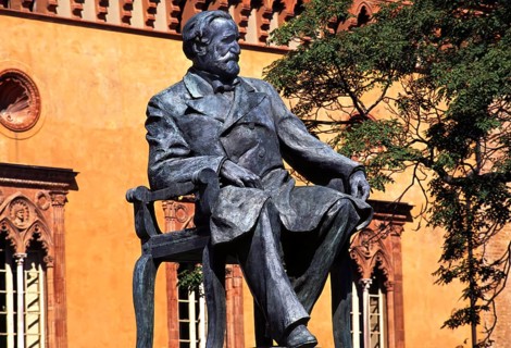 Verdi monument in front of Rocca dei Marchesi Pallavicino, now the city hall, with Teatro Giuseppe