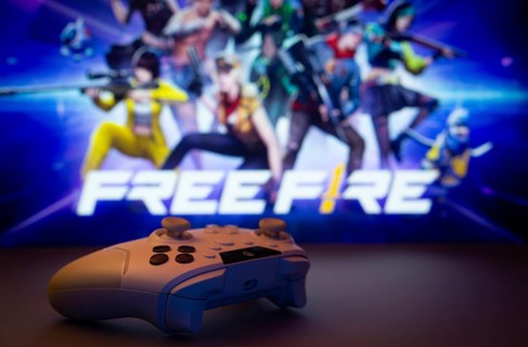 Dhaka, Bangladesh- 03 July 2025: A close-up of a white gamepad with the Garena Free Fire seen on