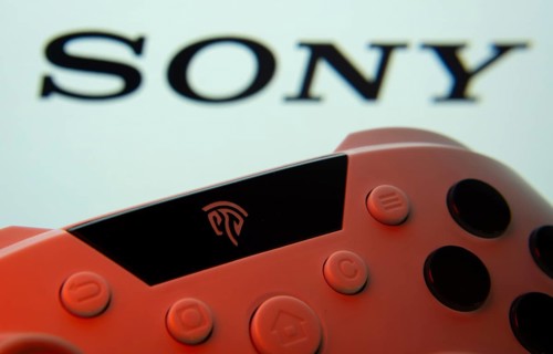 Dhaka, Bangladesh- 02 July 2025: A close-up of a gamepad with the sony seen on screen in the