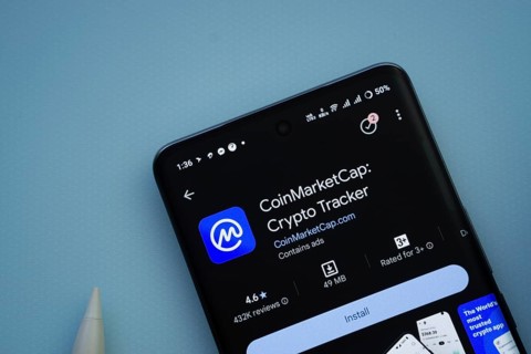 Dhaka, Bangladesh- 29 May 2025: On a blue surface, a smartphone displays the Coinmarketcap app
