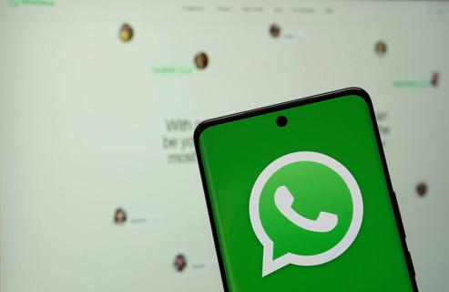 Dhaka, Bangladesh - 04 July 2025: The logo of the WhatsApp is displayed on a smartphone screen, and
