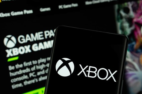 Dhaka, Bangladesh- 04 July 2025: Xbox logo is displayed on a smartphone screen, with the website